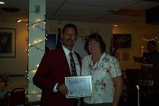 MATT PIEPER PRESENTING DEBBIE BAASTAD WITH THE EXALTED RULER'S APPRECIATION AWARD